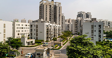 a view of high & low rise towers of lifestyle homes in vatika inxt a project by vatika group