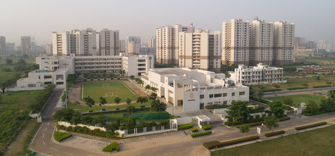 front overview of matrikiran school with gurgaon 21 in the background in vatika inxt by vatika group
