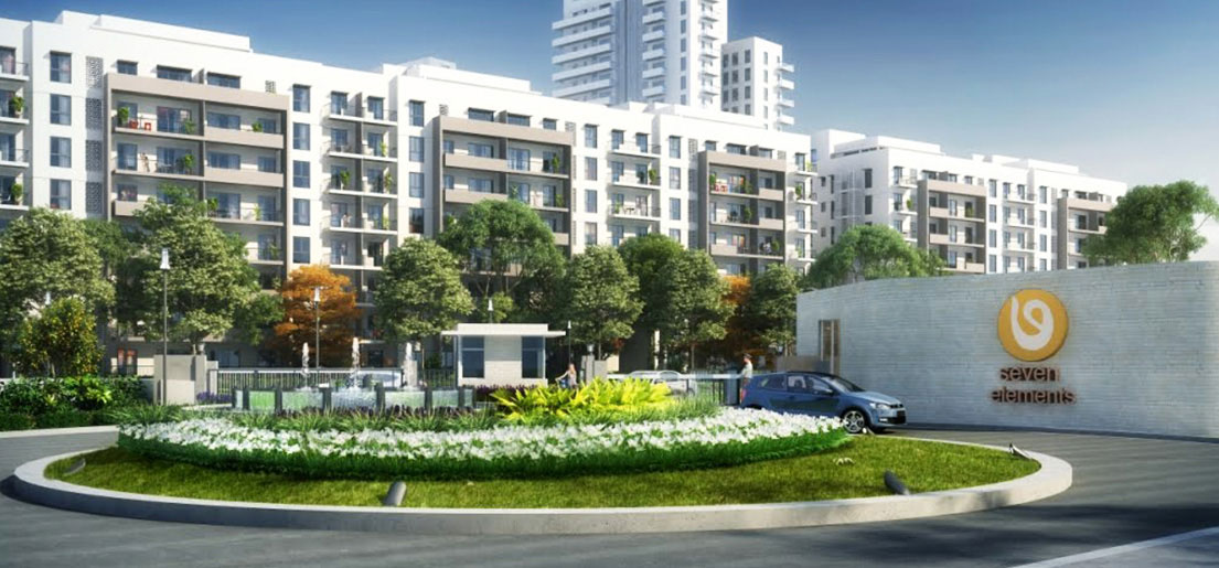 a rendering of a view of the vatika seven elements project from outside the gate a project by vatika group